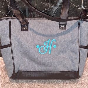 31 Cross body bag with “H”